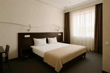 Улучшенный номер с кроватью размера «king-size» или 2 отдельными кроватями в Гостинице Премьер